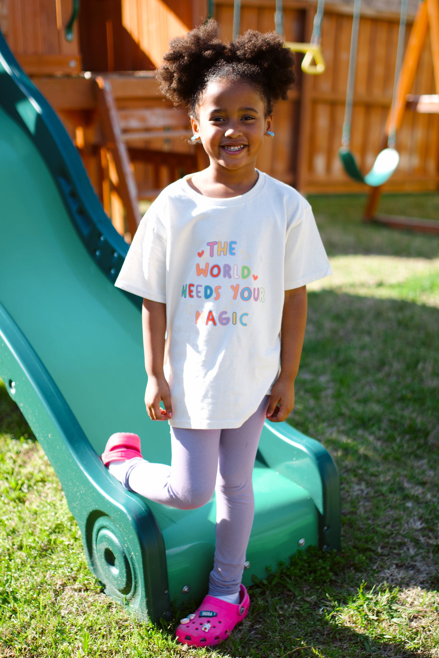 The World Needs Your Magic Kids Tee
